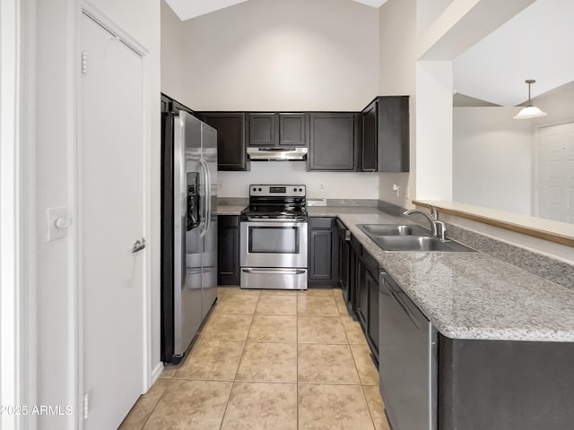 10242 N 66th Ave, Glendale, AZ 85302 - kitchen featuring appliances with stainless steel finishes, under cabinet range hood, a sink, light tile patterned flooring, and light stone countertops