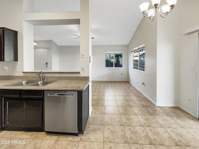 10242 N 66th Ave, Glendale, AZ 85302 - kitchen with stainless steel dishwasher, a sink, light tile patterned flooring, a chandelier, and vaulted ceiling