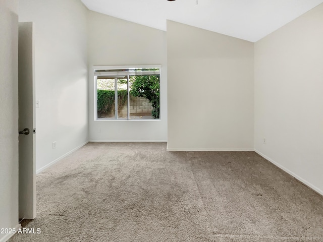 10242 N 66th Ave, Glendale, AZ 85302 - carpeted spare room with lofted ceiling, baseboards, and a ceiling fan