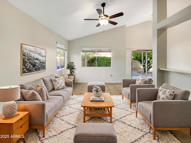 10242 N 66th Ave, Glendale, AZ 85302 - living area featuring vaulted ceiling, a ceiling fan, tile patterned flooring, and baseboards