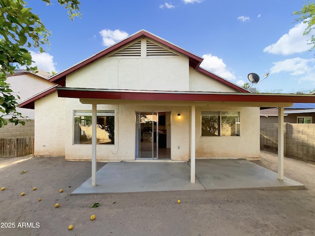 10242 N 66th Ave, Glendale, AZ 85302 - rear view of property with stucco siding, fence, and a patio