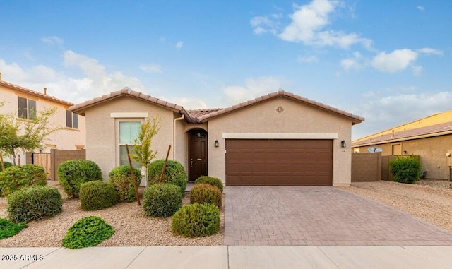 view of front of property featuring a garage