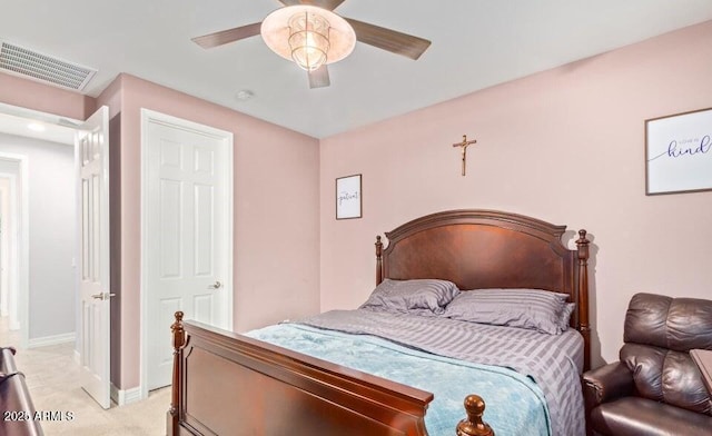 carpeted bedroom featuring ceiling fan