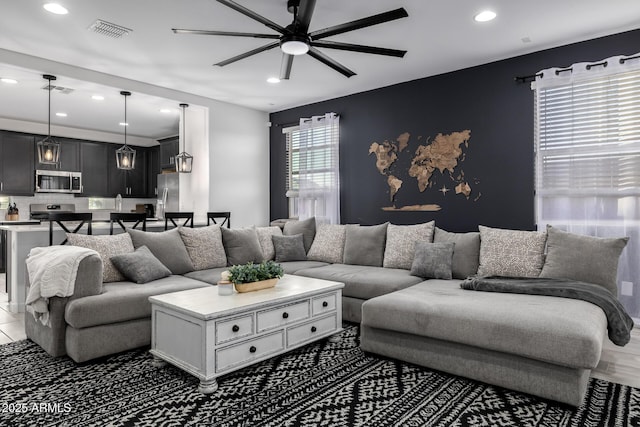 4352 N 91st Gln, Phoenix, AZ 85037 - living area with ceiling fan and recessed lighting