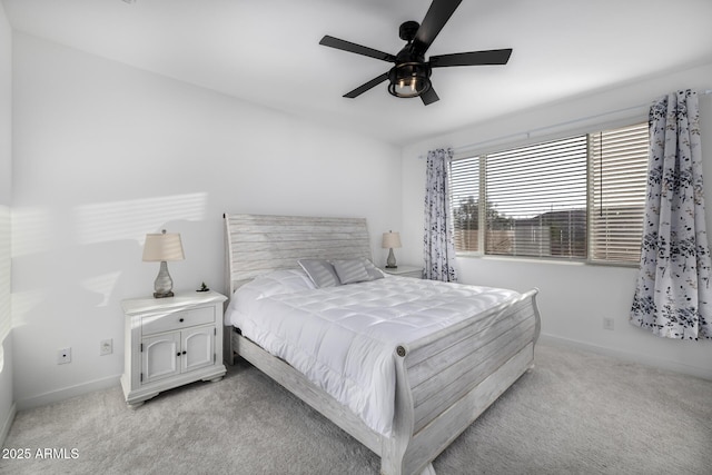 4352 N 91st Gln, Phoenix, AZ 85037 - bedroom featuring light carpet, baseboards, and ceiling fan