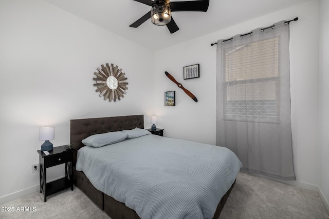 4352 N 91st Gln, Phoenix, AZ 85037 - carpeted bedroom featuring baseboards and a ceiling fan