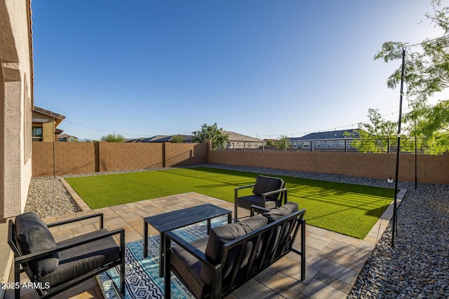 4352 N 91st Gln, Phoenix, AZ 85037 - view of patio / terrace featuring an outdoor living space