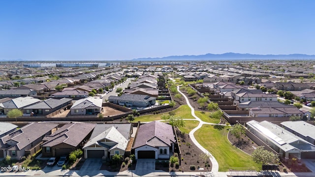 4352 N 91st Gln, Phoenix, AZ 85037 - aerial perspective of suburban area with a mountain backdrop