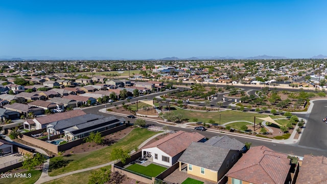 4352 N 91st Gln, Phoenix, AZ 85037 - aerial perspective of suburban area with a mountainous background