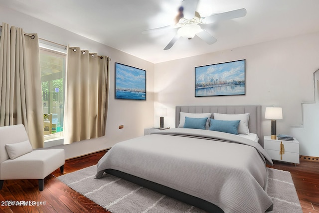 bedroom with ceiling fan and wood finished floors