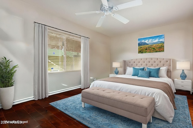 bedroom with a baseboard radiator, wood finished floors, and a ceiling fan