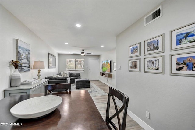 interior space featuring hardwood / wood-style flooring and ceiling fan