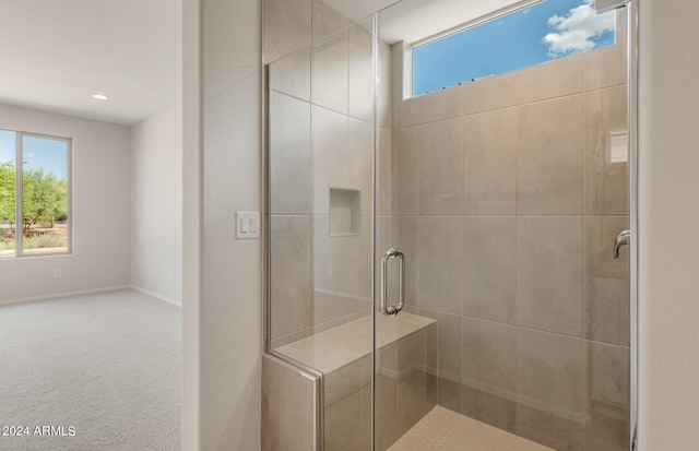 bathroom with an enclosed shower