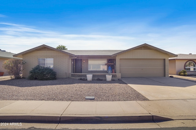 ranch-style home with a garage