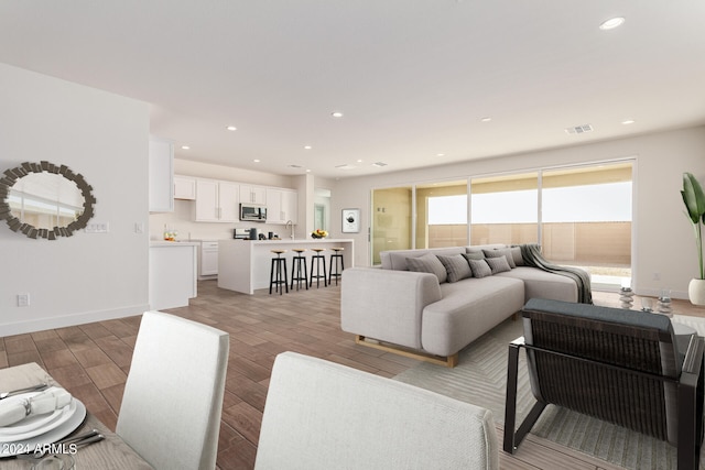 living room featuring light hardwood / wood-style floors