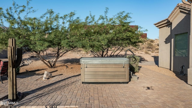 9864 E Baseline Ave, Gold Canyon, AZ 85118 - view of patio with a hot tub