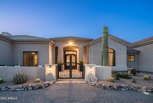 9864 E Baseline Ave, Gold Canyon, AZ 85118 - view of front of property featuring a fenced front yard, a gate, and stucco siding