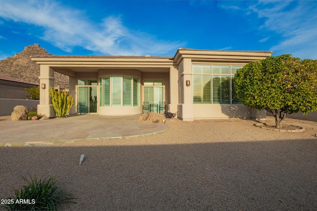 view of front of house featuring a patio