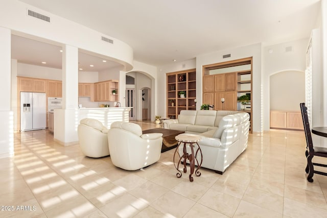 living room with light tile patterned floors