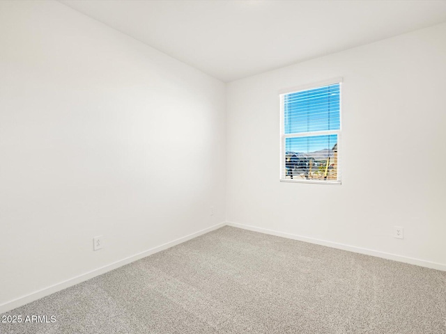 empty room featuring carpet floors