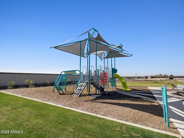 view of playground featuring a yard