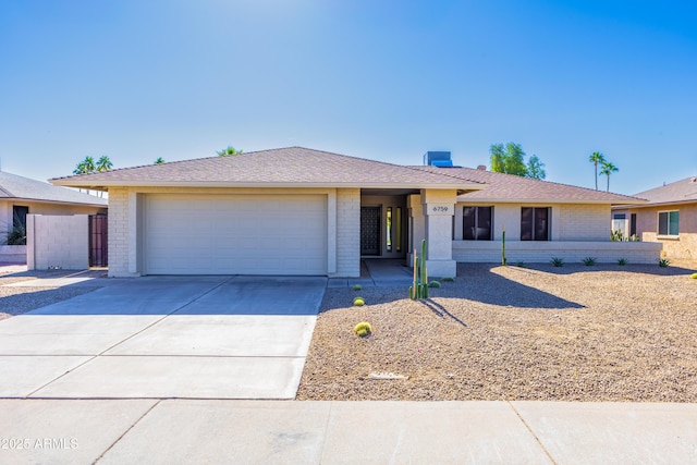 single story home with a garage