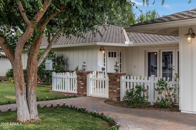 3817 E Highland Ave, Phoenix, AZ 85018 - view of front of house featuring a shingled roof and board and batten siding