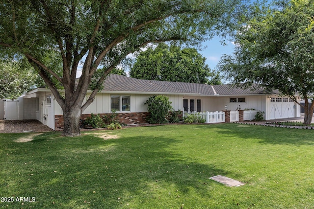 3817 E Highland Ave, Phoenix, AZ 85018 - ranch-style home with board and batten siding and brick siding