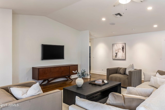 3817 E Highland Ave, Phoenix, AZ 85018 - living room with ceiling fan, wood finished floors, vaulted ceiling, baseboards, and recessed lighting