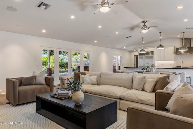 3817 E Highland Ave, Phoenix, AZ 85018 - living area with a ceiling fan, lofted ceiling, and recessed lighting
