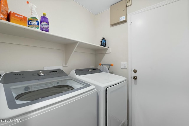 laundry room featuring washer and clothes dryer