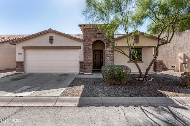 view of front of home with a garage