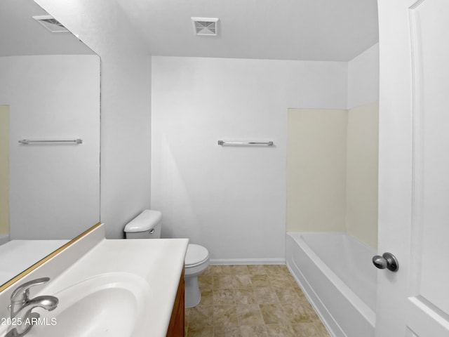 40168 W Sanders Way, Maricopa, AZ 85138 - bathroom featuring toilet, vanity, and baseboards