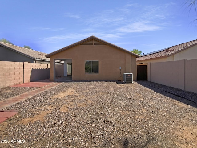 40168 W Sanders Way, Maricopa, AZ 85138 - back of house with central AC, stucco siding, a tiled roof, and a patio area