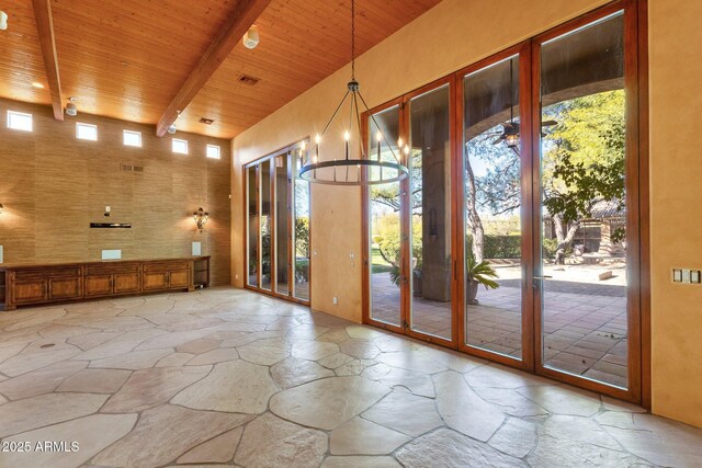 9980 E Charter Oak Rd, Scottsdale, AZ 85260 - doorway featuring a towering ceiling, beam ceiling, and wooden ceiling