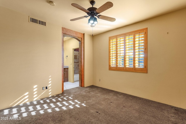 9980 E Charter Oak Rd, Scottsdale, AZ 85260 - carpeted spare room with ceiling fan