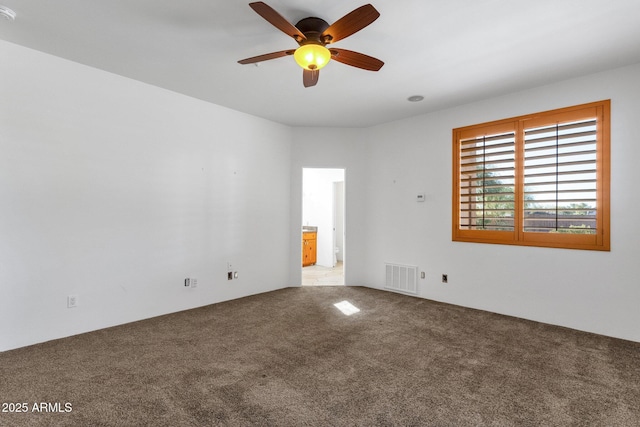 9980 E Charter Oak Rd, Scottsdale, AZ 85260 - carpeted empty room featuring ceiling fan