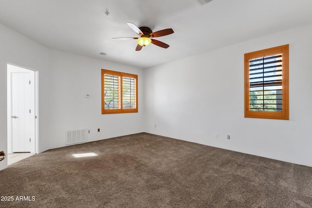 9980 E Charter Oak Rd, Scottsdale, AZ 85260 - carpeted empty room with ceiling fan