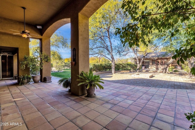 9980 E Charter Oak Rd, Scottsdale, AZ 85260 - view of patio / terrace with ceiling fan