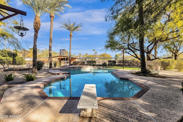 9980 E Charter Oak Rd, Scottsdale, AZ 85260 - view of pool with a diving board and a patio