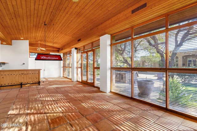 9980 E Charter Oak Rd, Scottsdale, AZ 85260 - unfurnished sunroom with vaulted ceiling and wooden ceiling