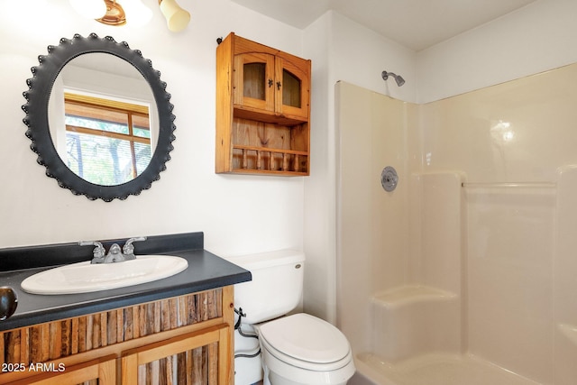 9980 E Charter Oak Rd, Scottsdale, AZ 85260 - bathroom with a shower, vanity, and toilet