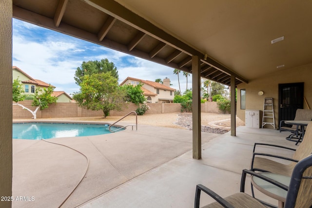 view of pool with a fenced in pool, a patio area, and a fenced backyard