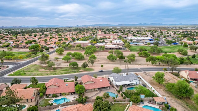 drone / aerial view featuring a mountain view and a residential view