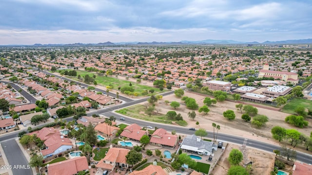 aerial view with a mountain view and a residential view