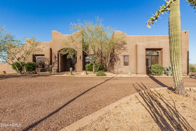 view of adobe home