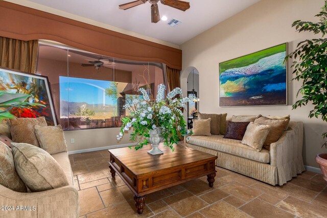 living room featuring ceiling fan