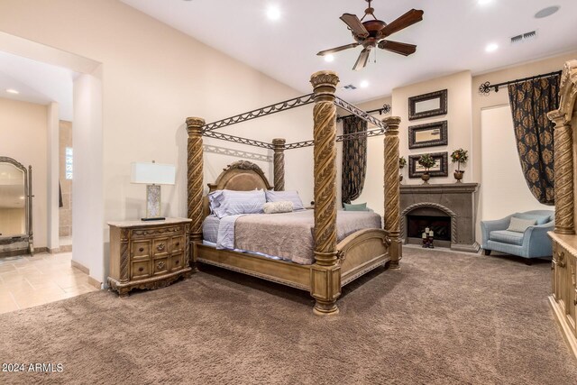 bedroom with ceiling fan and carpet