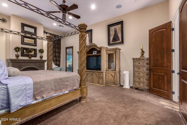 bedroom with ceiling fan and carpet