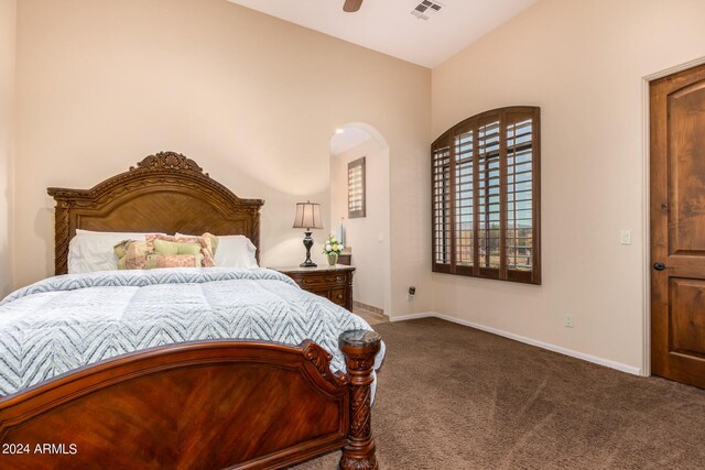 bedroom featuring carpet floors and vaulted ceiling